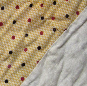image of Antique yellow fabric with spot